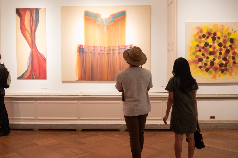 Students looking at art in the Brady Gallery